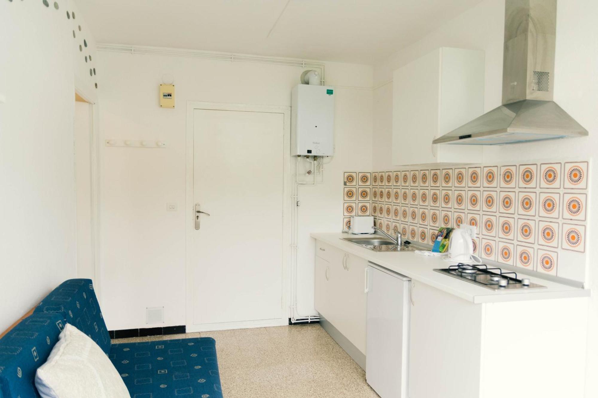 Apartaments Falco Llança Buitenkant foto